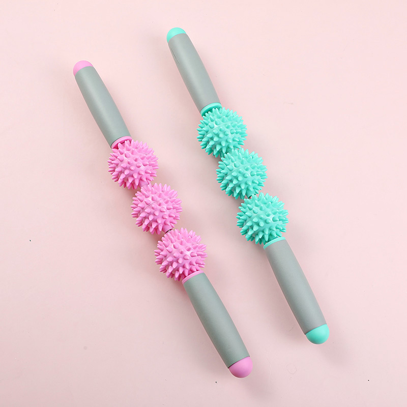 Muscle massage stick with spiky balls