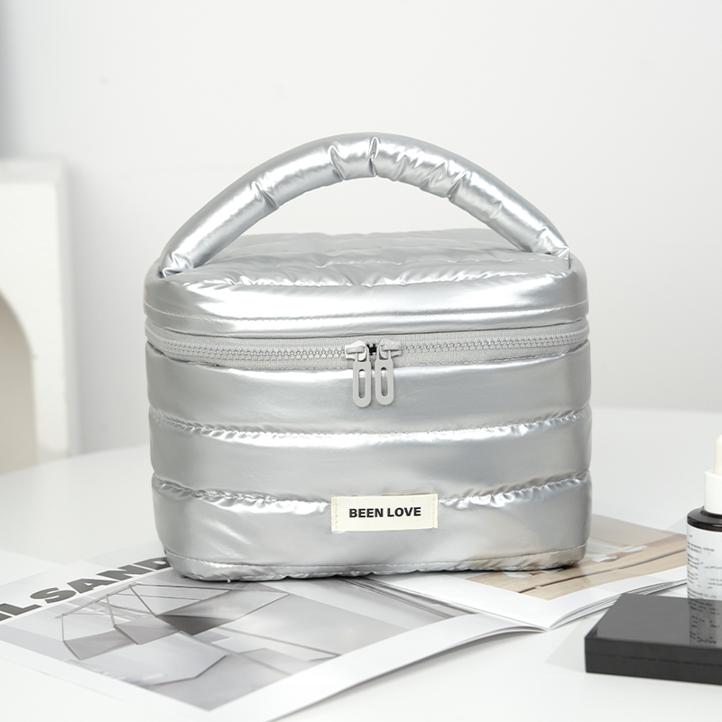 Silver surface velvet covered makeup bag